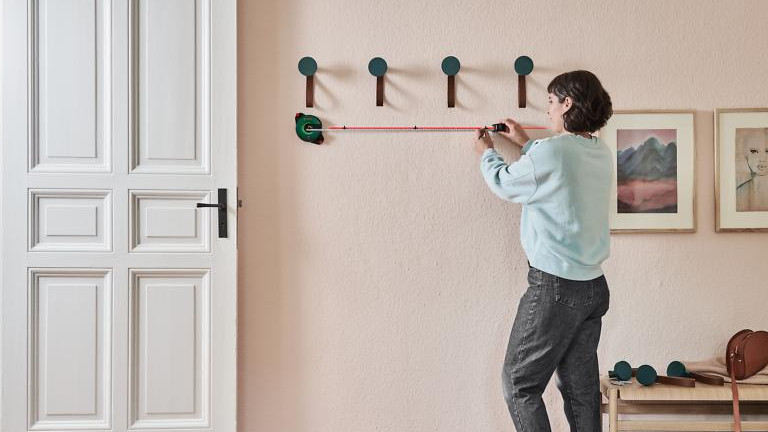 BOSCH Atino Set svinovací metr s laserovou linkou + set gelových podložek (6x) Obrázek