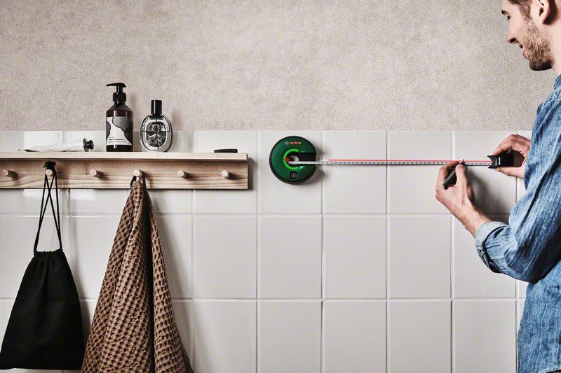 BOSCH Atino Set svinovací metr s laserovou linkou + set gelových podložek (6x) Obrázek